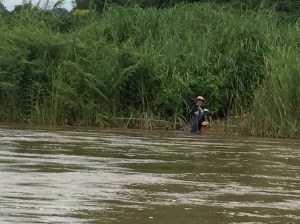 Fishing along the shore.